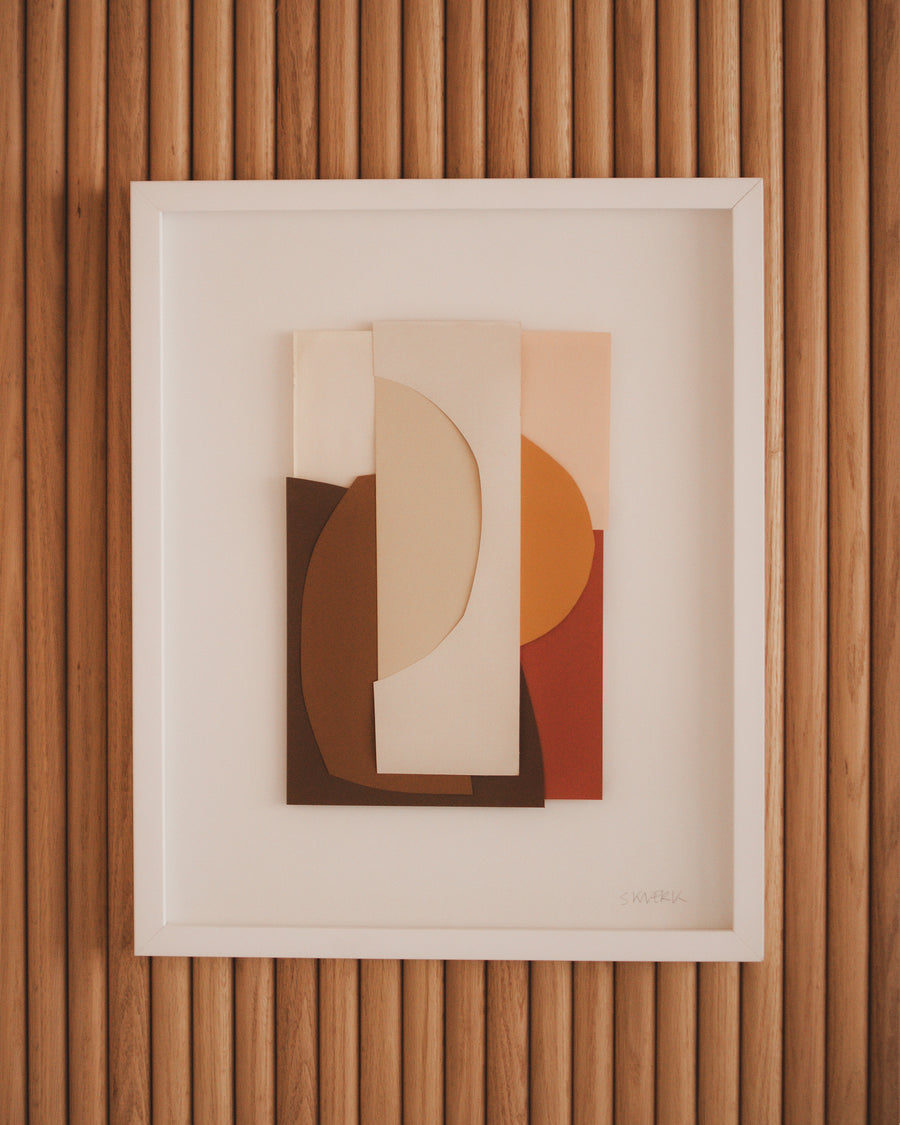 framed layered paper aesthetic collage by Sophie Klerk of rounded shapes and cutouts in autumnal colors