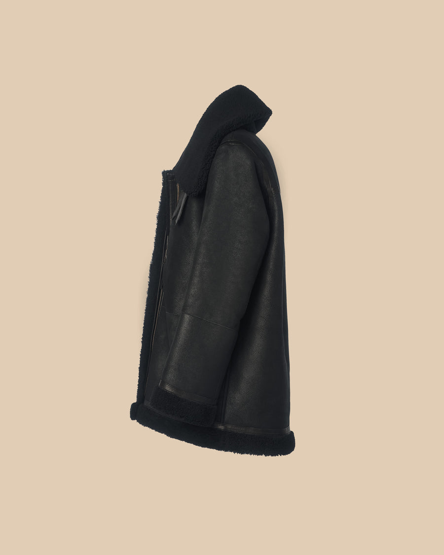 womens black waxed suede and black shearling reversible shearling jacket with leather detailing on collar