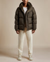 khaki nylon water resistant unisex puffer jacket with shearling lined hood and collar