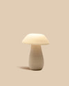 cozy handcrafted ivory ceramic mushroom-shaped table lamp with ambient lighting