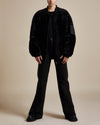 unisex black reversible lightweight water-resistant quilted nylon and shearling bomber jacket