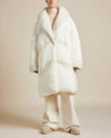 long ivory water resistant lightweight duvet style puffer coat with shearling collar and front button closure