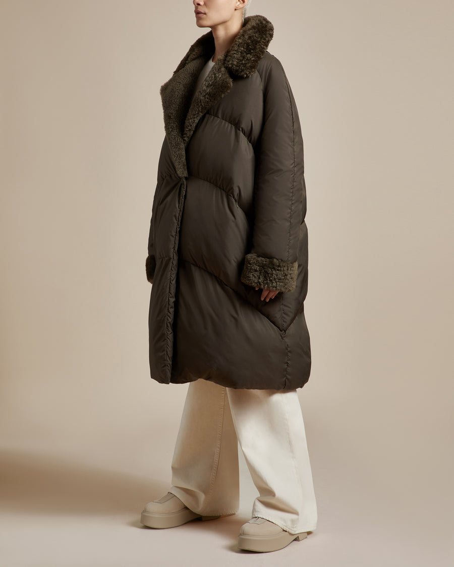 long khaki water resistant lightweight duvet style puffer coat with shearling collar and front button closure