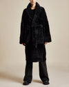 long black sophisticated mid length reversible women's shearling coat with silky napa finish shawl collar and belt
