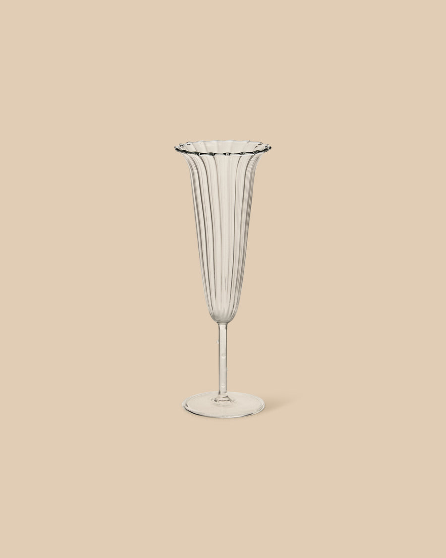 Sophie Lou Jacobsen Angel Flute set of 4 champagne glasses, hand-blown with a design inspired by the Angel Flute flower. A thoughtful addition to any celebration.
