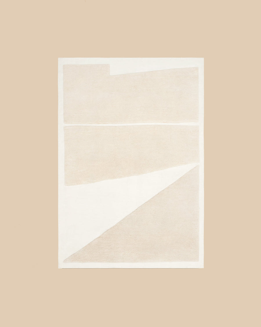 Untitled 2 Rug by Nordic Knots in cream and almond, hand-knotted New Zealand wool with tonal abstract shapes in shaggy pile on a flat-woven ground