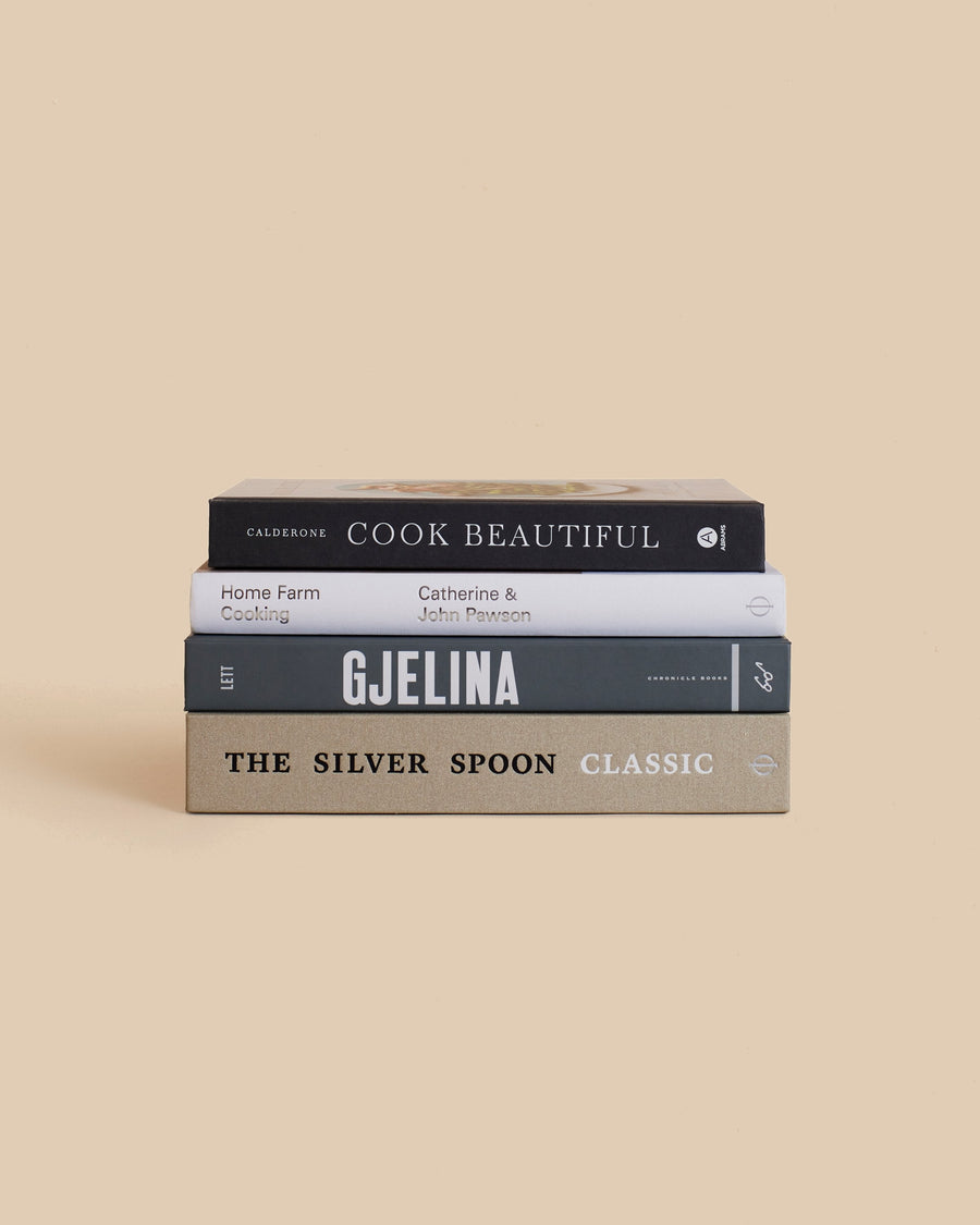 The Fifth Sense Book Stack by Maison Plage for Arjé, four cookbooks in black, white and taupe including Gjelina and The Silver Spoon