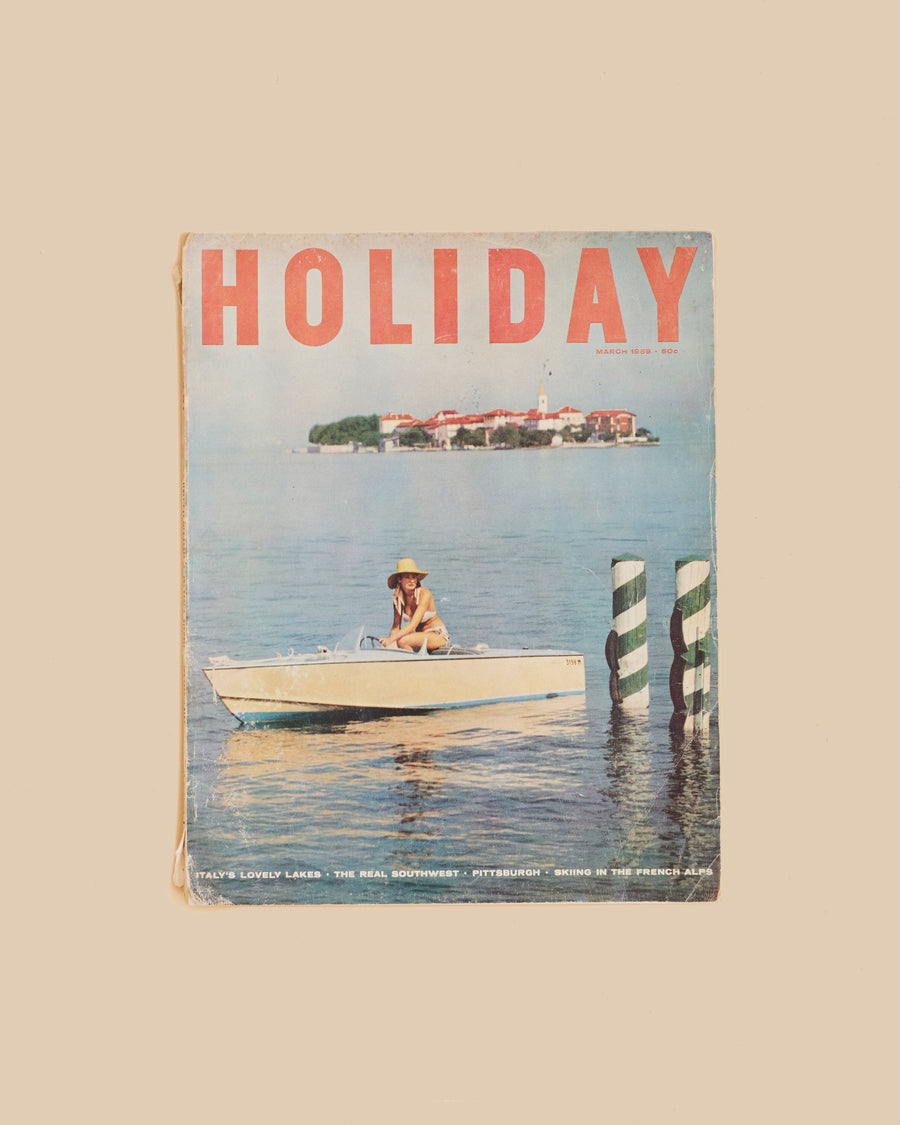 Vintage Holiday Magazine March 1959, with a small boat beside a lagoon island on the cover