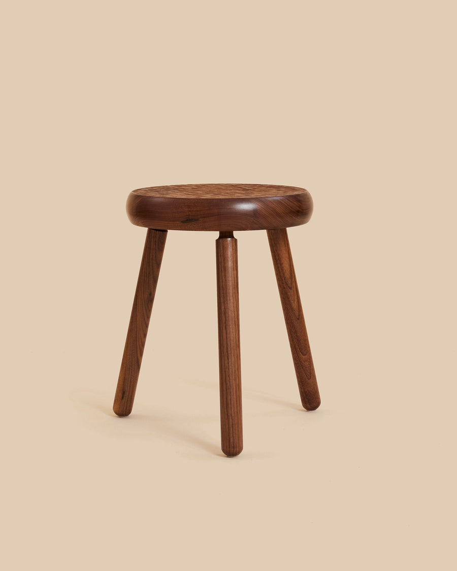 elegant minimalist handcrafted solid walnut wood stool with carved textured seat