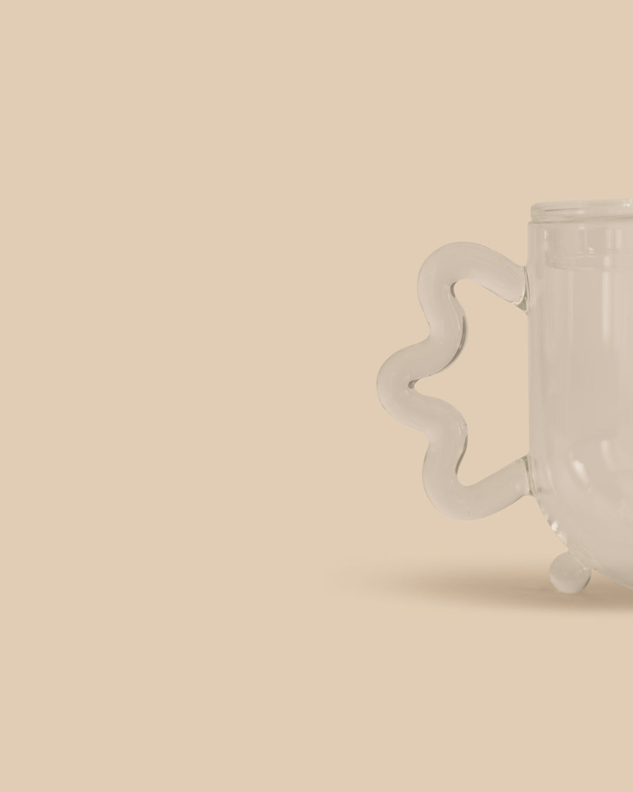 Sophie Lou Jacobsen Bloom Teapot, designed in collaboration with The Qi. Playful teapot with a transparent design, perfect for steeping flowers or any tea.
