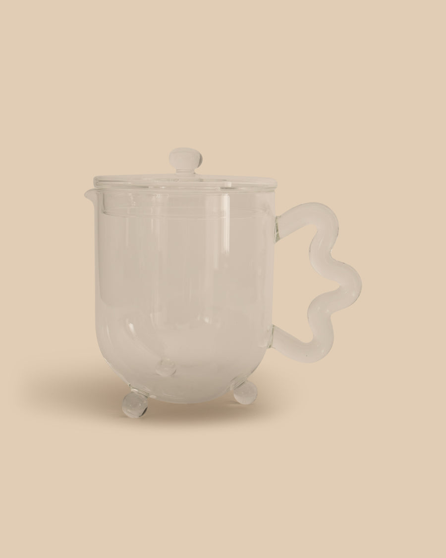 Sophie Lou Jacobsen Bloom Teapot, designed in collaboration with The Qi. Playful teapot with a transparent design, perfect for steeping flowers or any tea.
