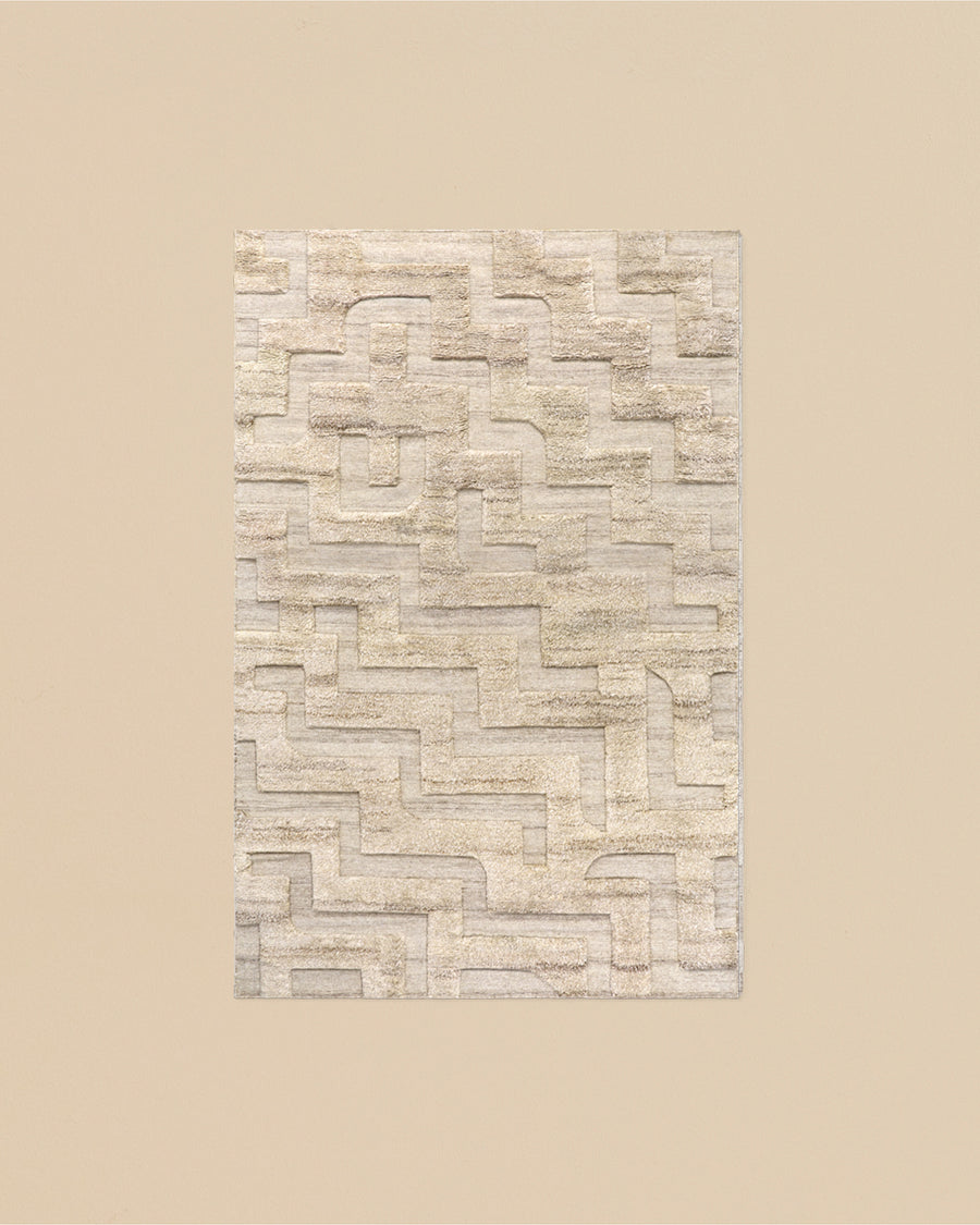 all natural European wool textured pile boho rug in sand melange with geometric patterns 