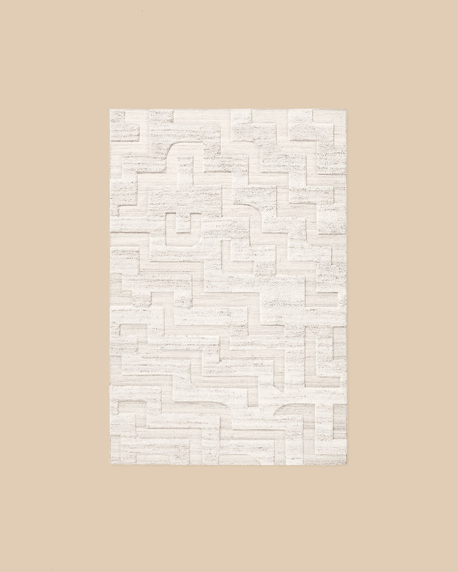 Boho Rug by Nordic Knots in cream mix, European wool with a carved maze-like relief pattern in textured pile