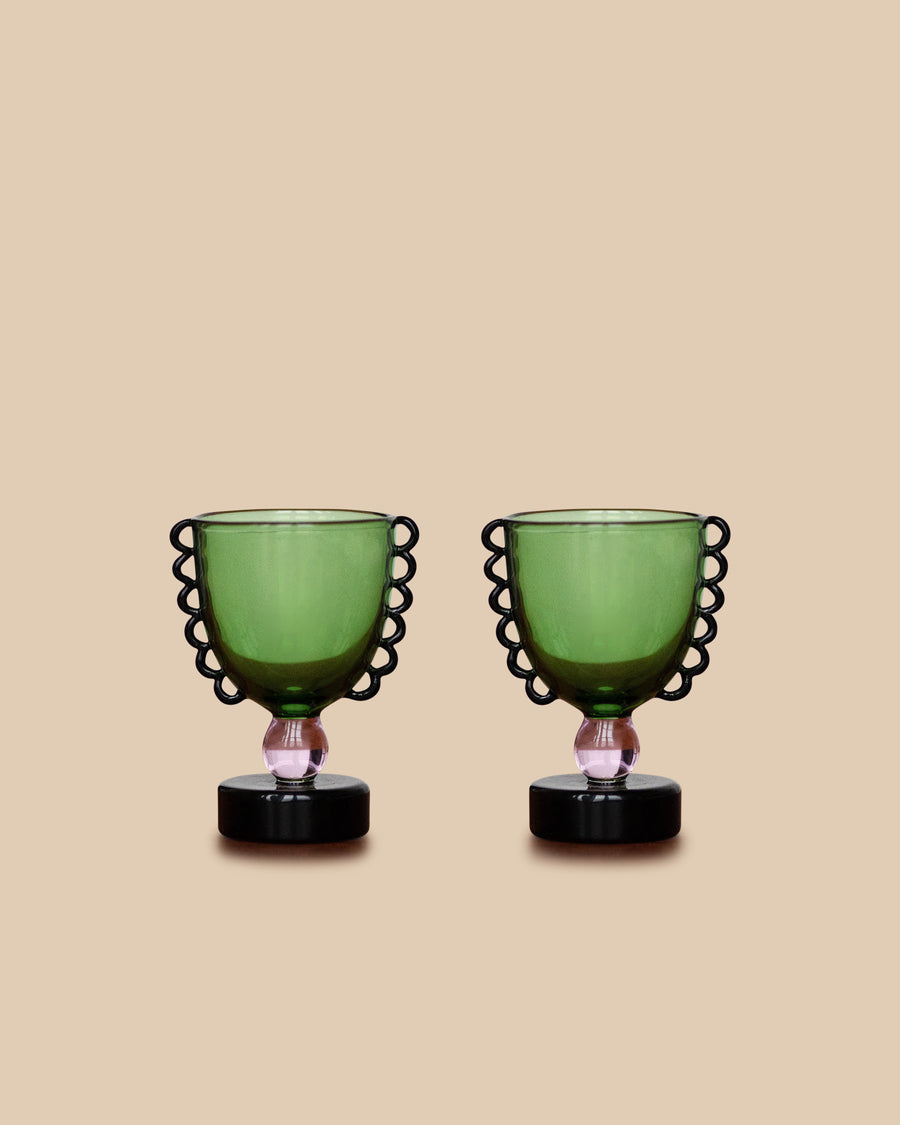 Sophie Lou Jacobsen Coco Cup Set, a pair of sculptural, multi-functional vessels perfect as a throne for an egg, shot glass, or cocktail pick holder. Playful design.
