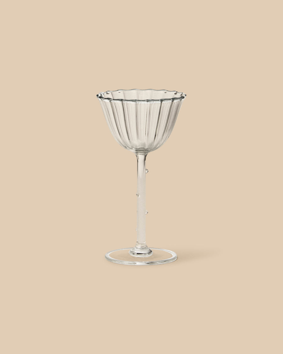 Sophie Lou Jacobsen Cosmo Cordial Coupe set of 4, miniature sculptural glasses designed for liqueurs and digestifs. Elegant and refined addition to any collection.
