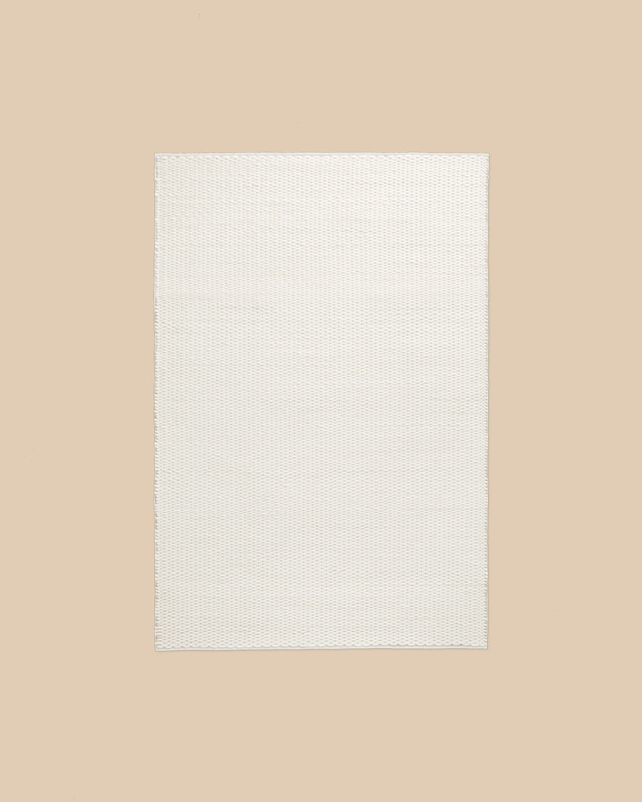 Dunes Rug by Nordic Knots in cream, hand-knotted New Zealand wool in a plain heavy-yarn plush pile