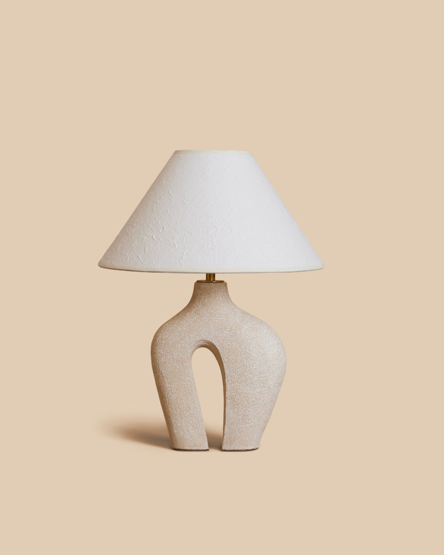 Kassandra Thatcher Hepworth sculptural ceramic table lamp in sand with an ivory rice paper shade