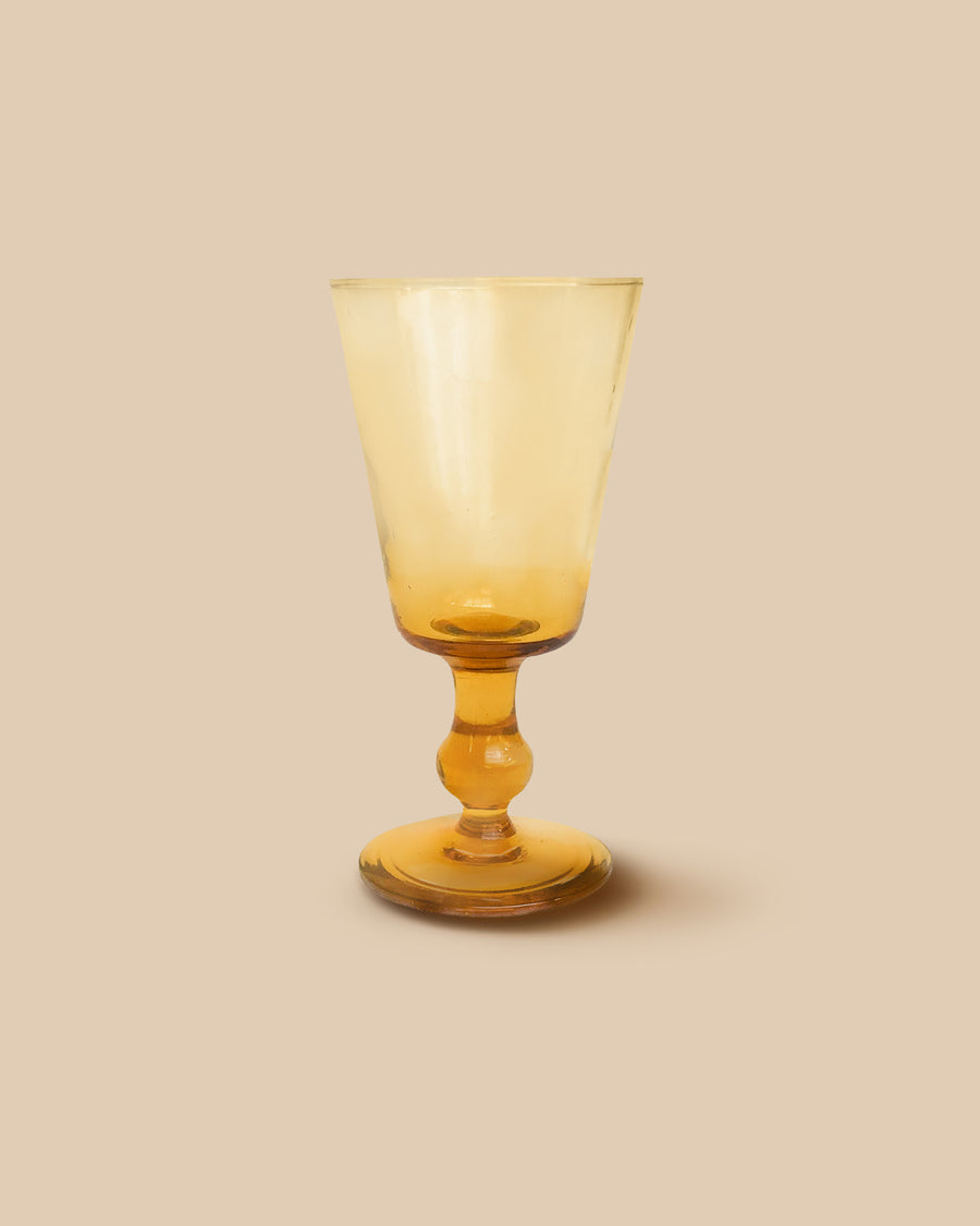 hand blown artisan amber-colored glass stemmed water goblet