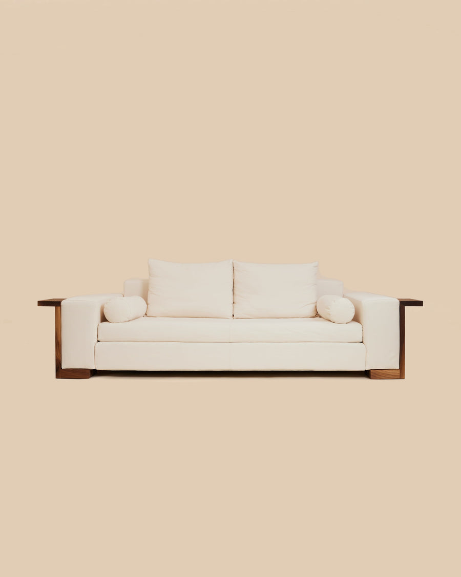 Noah Sofa by Arjé, deep-seated sofa in Italian cotton-linen blend with black walnut side panels, front view, made to order in California