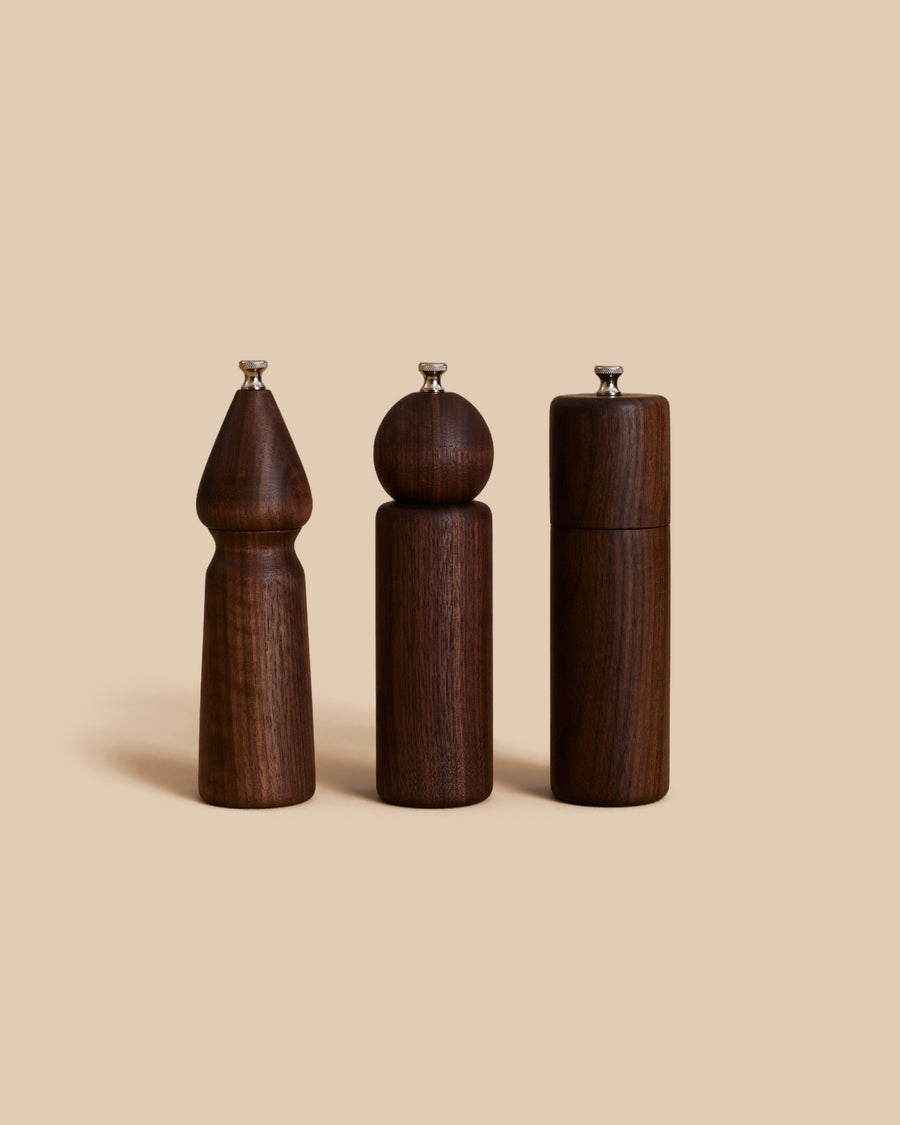 Trilogy Mill by PARE in solid walnut, three turned mills for salt, pepper and spice, each a different shape