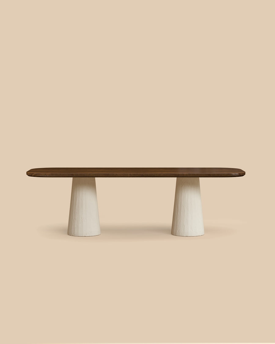 Tessa Dining Table by Arjé, solid walnut oval dining table with plaster legs, styled in modern kitchen setting