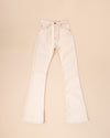 The Joelly Denim Flare Pants In Antique Ivory