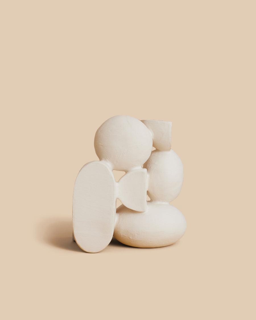 Velas N.42 by Re Jin Lee, a white hand-built ceramic sculpture of an upright oval set against three rounded forms
