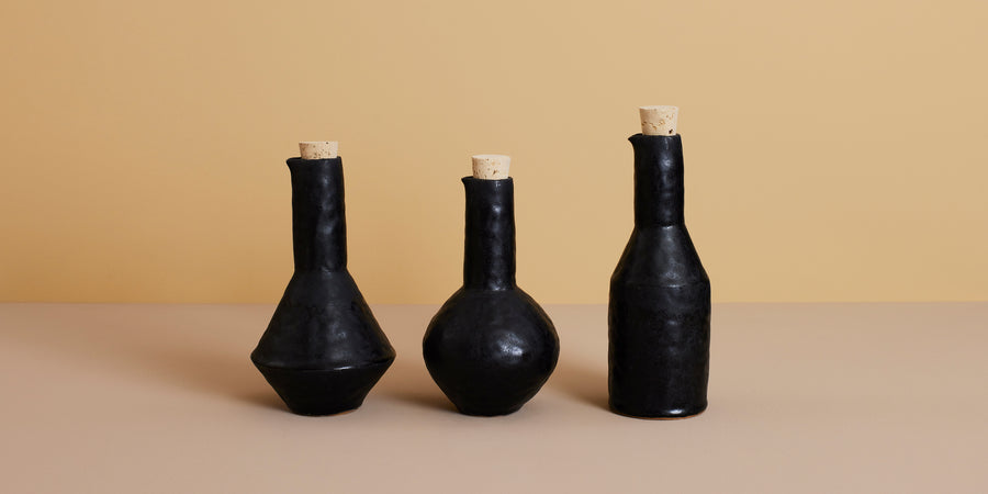 Bottle Trilogy in black stoneware — hand built by Giselle Hicks