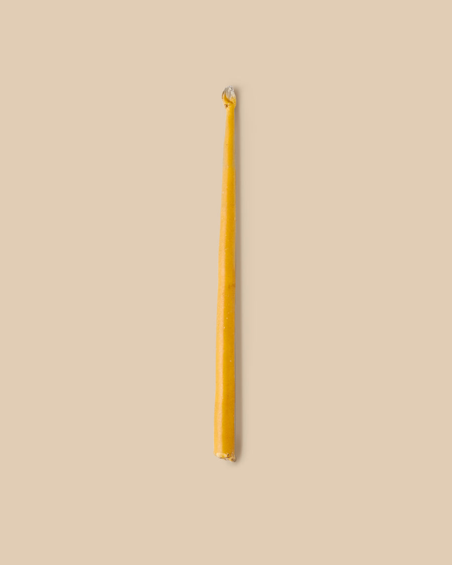 100% beeswax long slender Italian-made double hand dipped taper candle with hemp wick