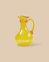 elegant hand blown artisan amber-colored glass pitcher