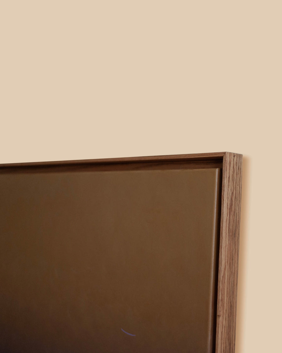 Terra by Rebecca von Matérn, acrylic on canvas in a slim frame, golden ochre warming through amber across the whole field