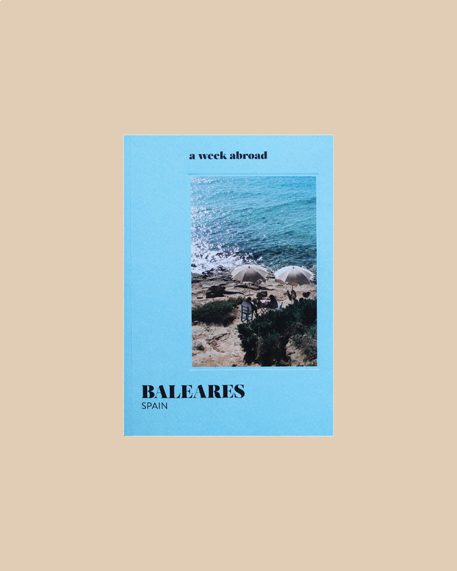 The Mediterranean Book Stack by Maison Plage for Arjé, four blue and white books on travel, food, art and photography