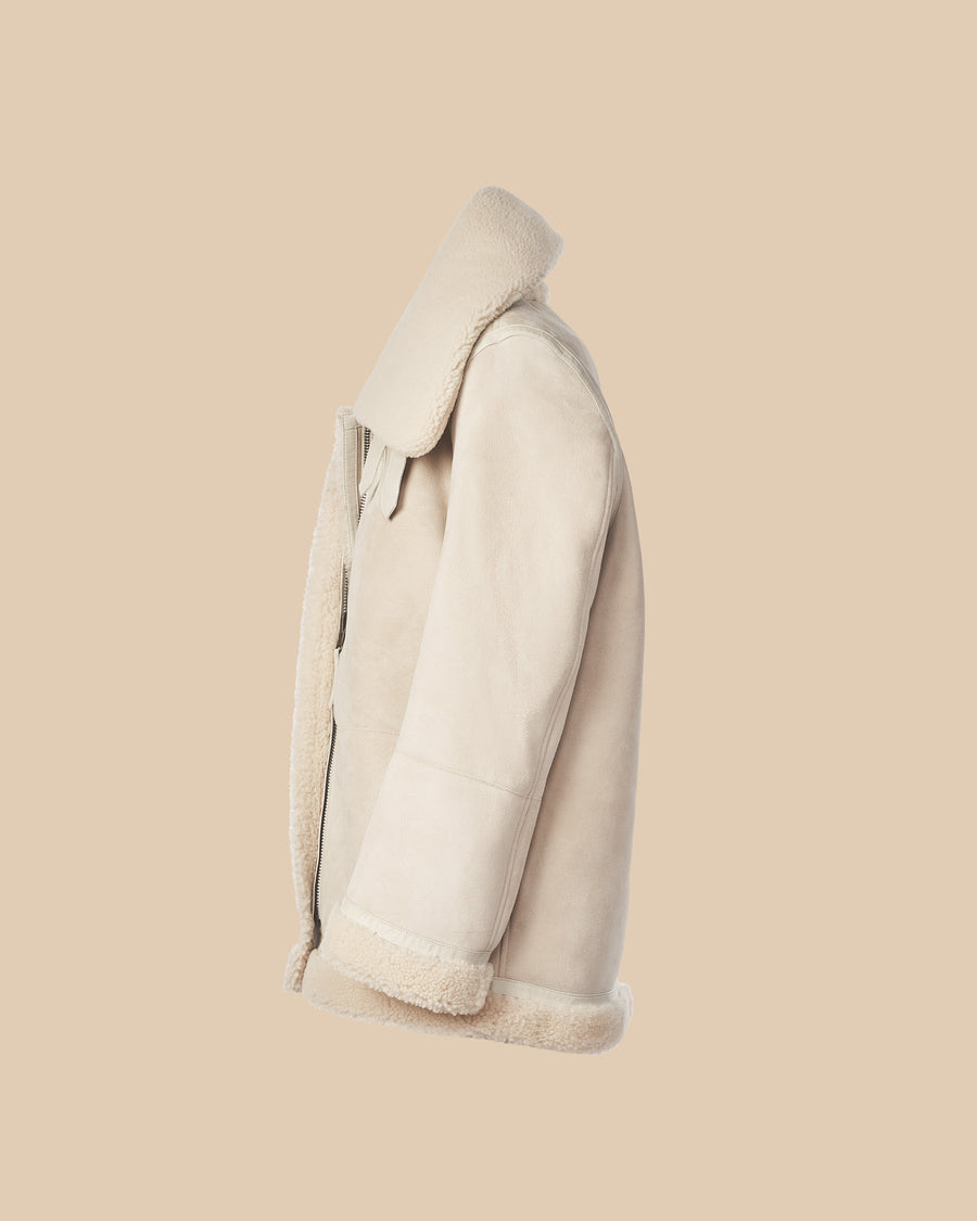 womens ivory waxed suede and ivory shearling reversible shearling jacket with leather detailing on collar