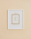 framed mixed media collage art by Sophie Klerk of layered rectangular shapes in white and beige