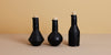 handmade black ceramic artisan oil and vinegar bottles