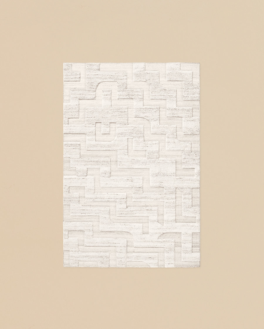 all natural European wool textured pile boho rug in cream melange with geometric patterns 