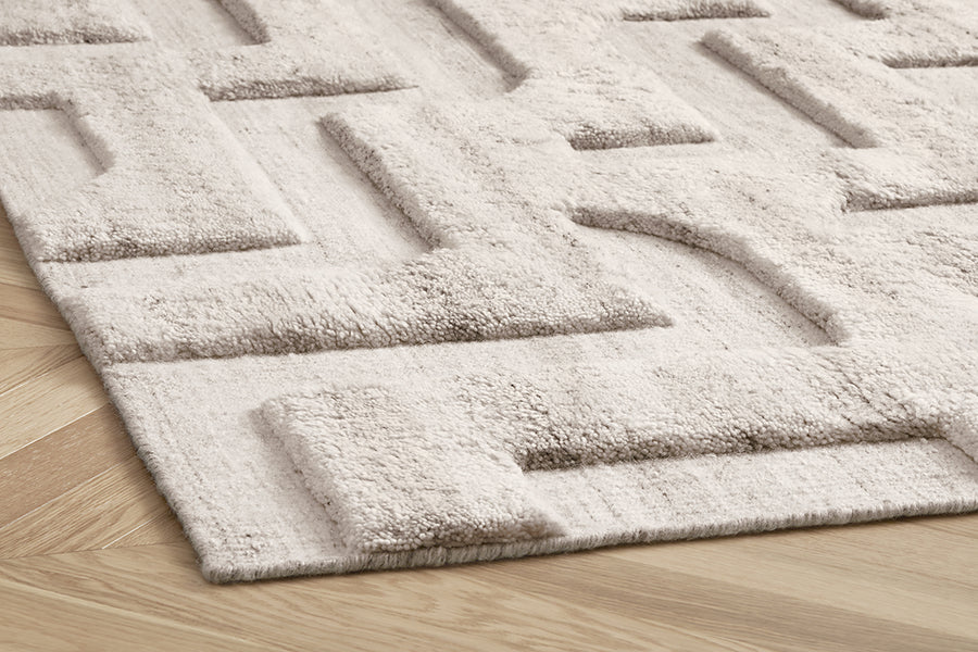 all natural European wool textured pile boho rug in cream melange with geometric patterns 