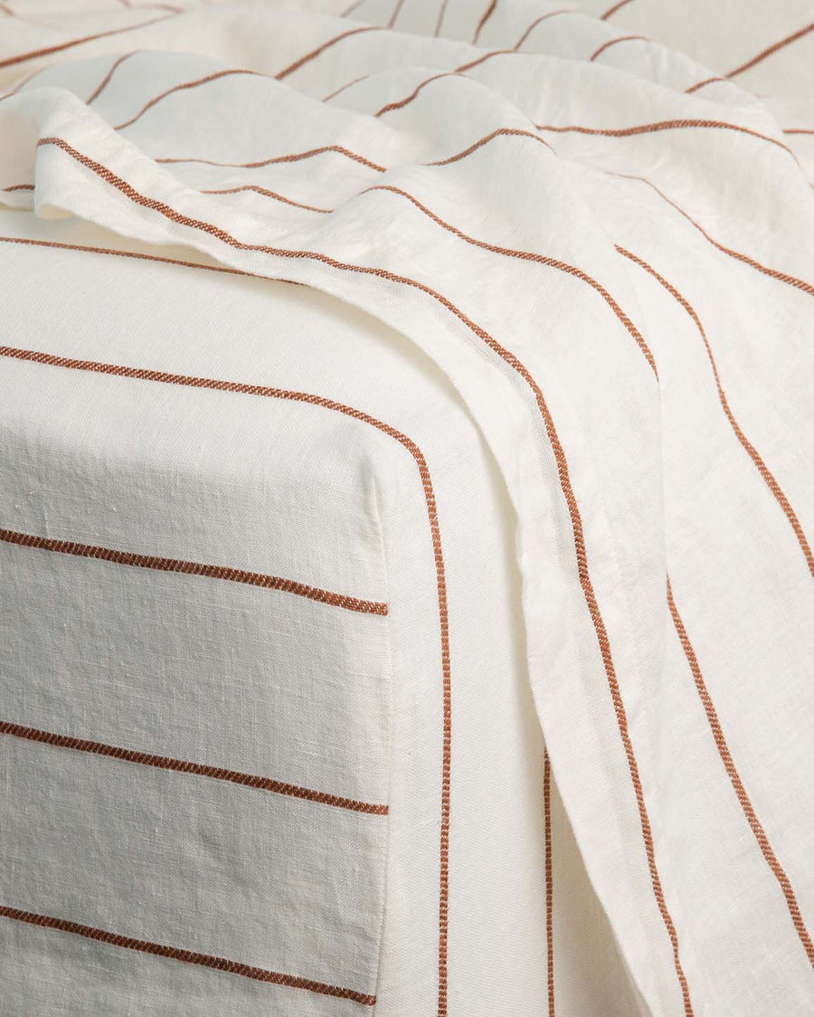 pre-washed terracotta and ivory striped linen sheets + pillowcases