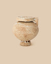 mediterranean handmade rounded small ceramic clay pottery vase with cream colored textured glazing