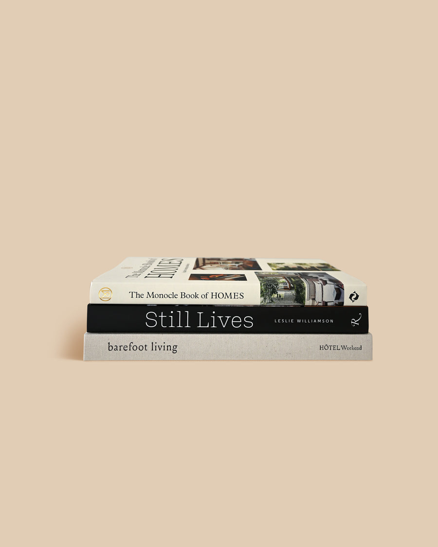 three neutral-colored interior design stacking books for decoration 