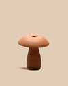 cozy handcrafted terracotta ceramic mushroom-shaped table lamp with ambient lighting