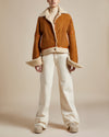  reversible women's suede jacket with camel suede and natural colored shearling drop sleeves and button closures