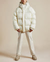 women's ivory nylon water resistant puffer jacket with shearling lined hood and collar