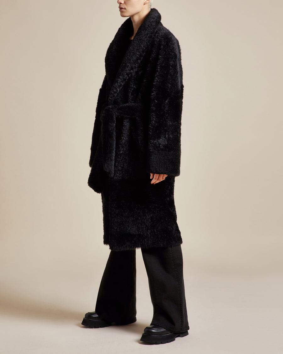 long black sophisticated mid length reversible women's shearling coat with silky napa finish shawl collar and belt