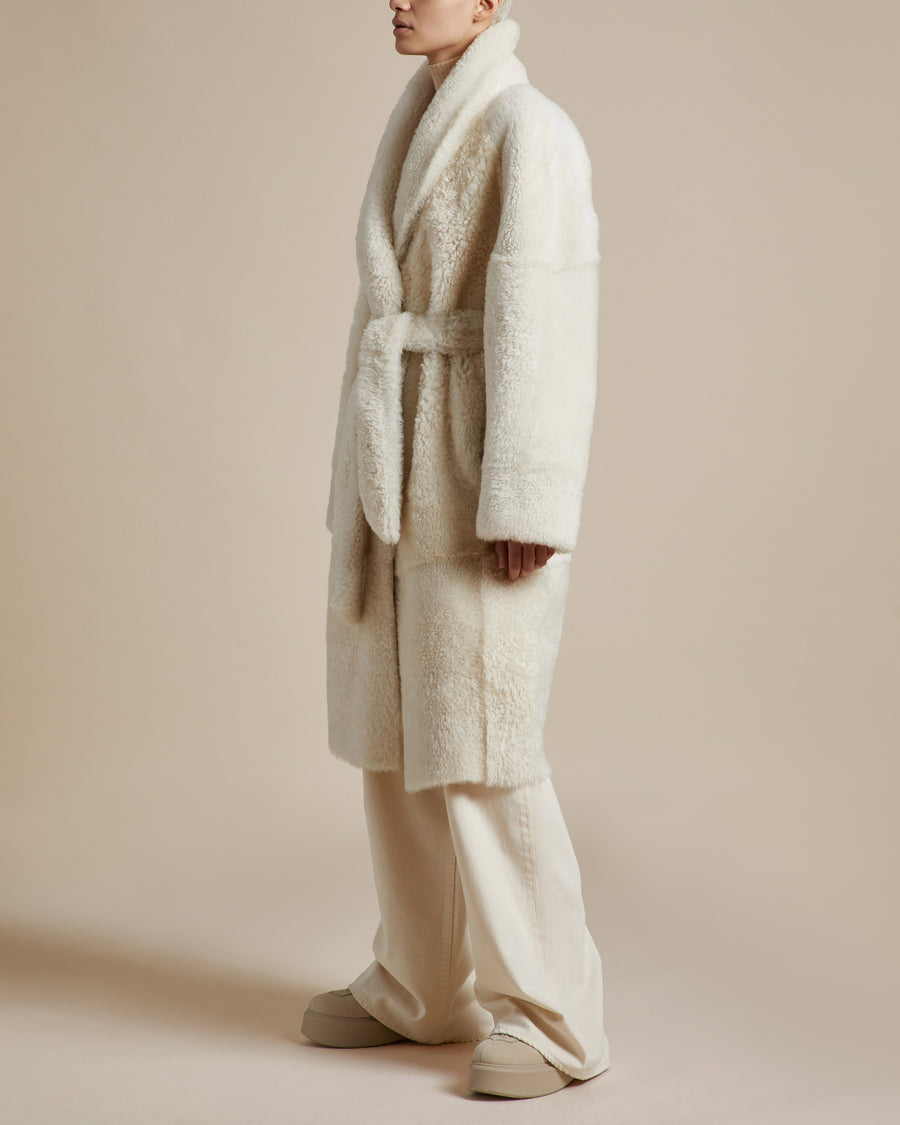 long ivory sophisticated mid length reversible women's shearling coat with silky napa finish shawl collar and belt